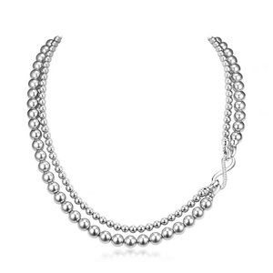 Double pearl necklace with figure 8